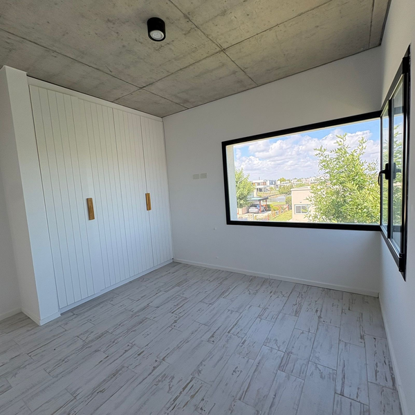 Dormitorio con placard