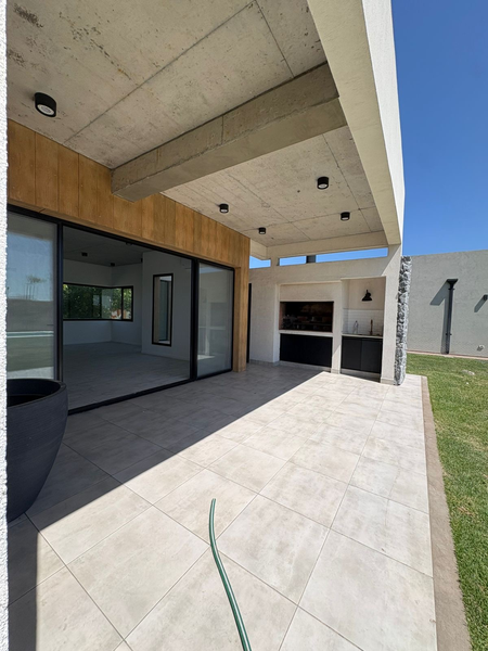 Galería cubierta con fogonero