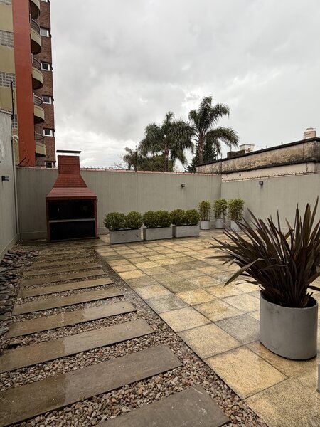 Espacio exterior con parrilla
