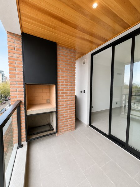 Living comedor y balc&oacute;n terraza